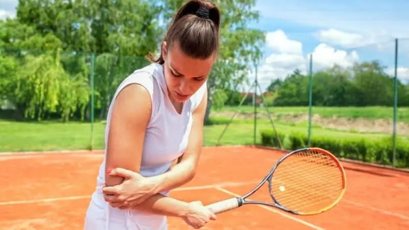 female tennis player injured elbow